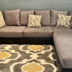 Living Room - Sectional Pillow Back Couch Plus Ottoman