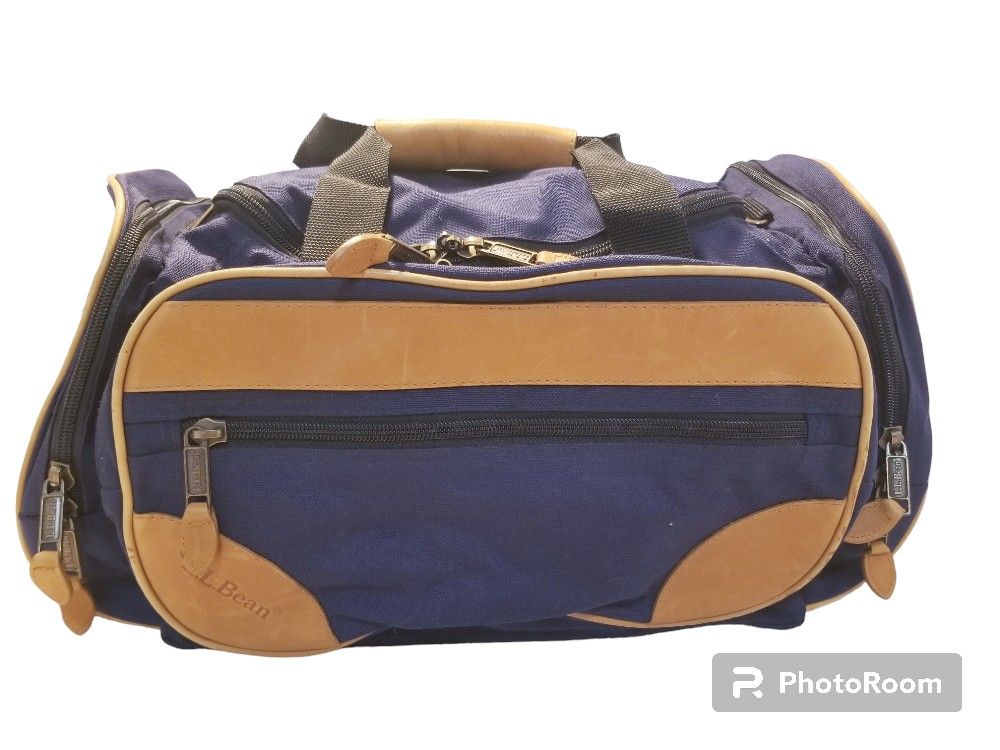 VINTAGE MINT L.L. BEAN CANVAN LEAHTER BLUE TAN DUFFEL BAG 14X11X9in
**PRICE IS FIRM**