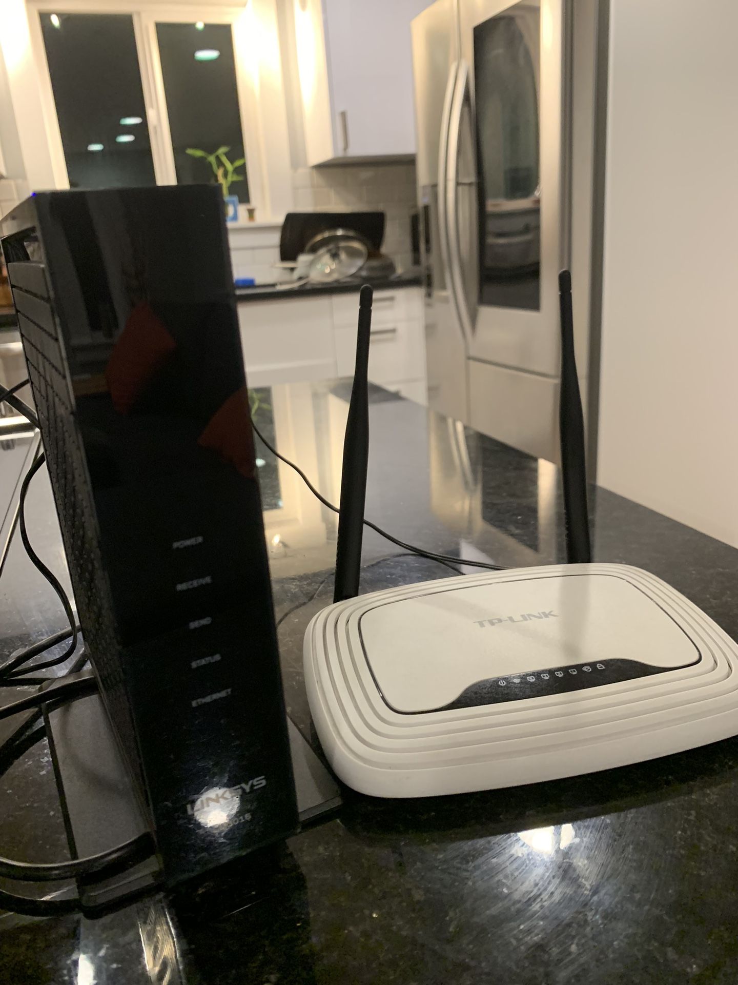 TP-LINK wireless router and Linksys modem