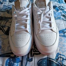 Adidas shoes for men size 11 in half 20 dollars