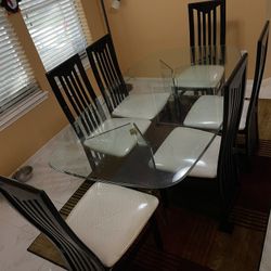 Glass Table And 6 Chairs
