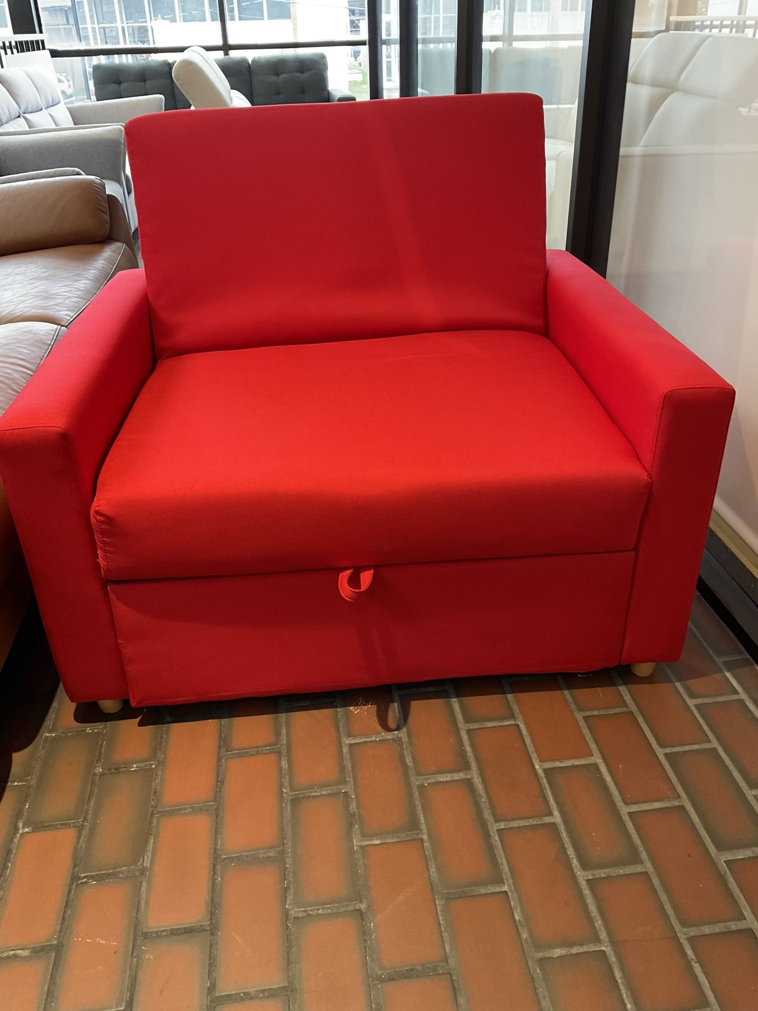 New Twin size extendable futon bed red color fabric upholstered.  