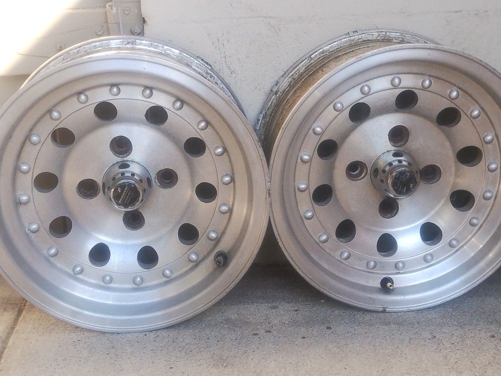 14 -inch Wheels 4 Lug Aluminum.