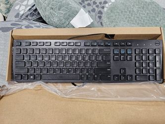 New, never used slim wired full size keyboard. 