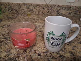 Candle and coffee cup
