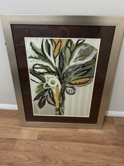 Picture with a metal and glass frame (28 * 33 h)
