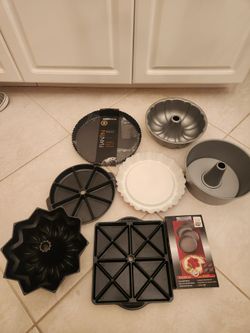 Lot of bake wear with bundt, scone and flan pans.