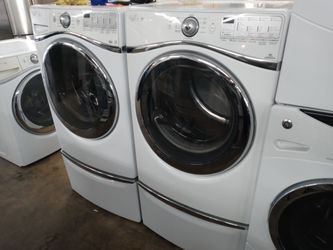 Whirlpool front load washer and dryer set on pedestals - Free delivery