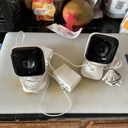 Xfinity Indoor/Outdoor Cameras. (2)
