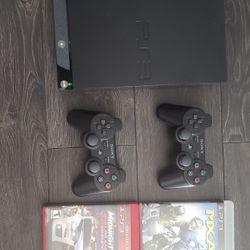 PLAYSTATION, TWO CONTROLLERS, THREE GAMES