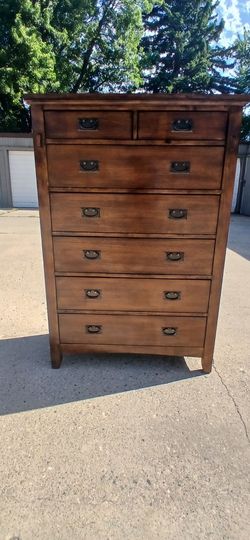 Brown dresser and night stand