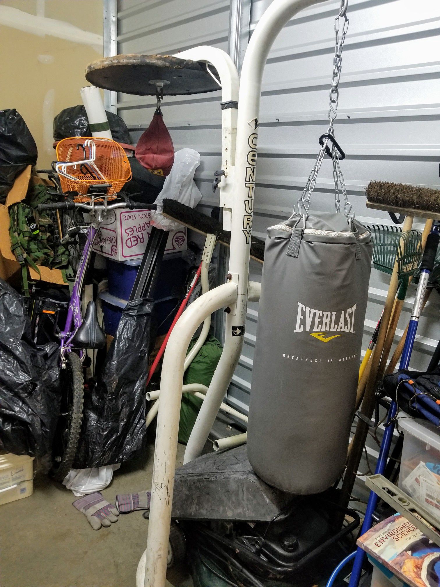 Complete NEW 60 lbs punching bag with (used) stand, (used) hand wraps, and NEW XL training gloves !