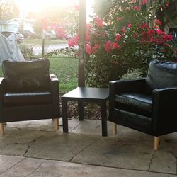 Two Black Leather Chairs