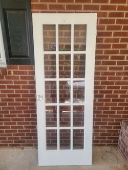 Interior wood and glass swinging door
