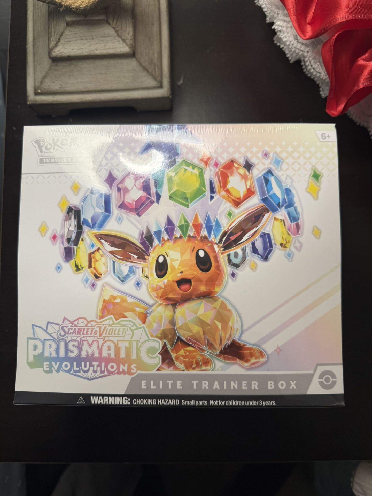 prismatic evolution elite trainer box