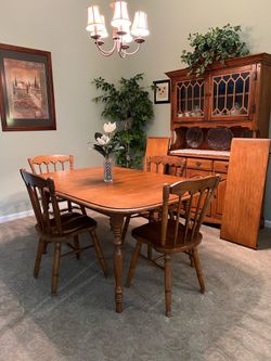 Dining table, 4 chairs, 2 leafs and cabinet