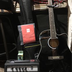 Brand new guitar with Caring Bag And Other Items 