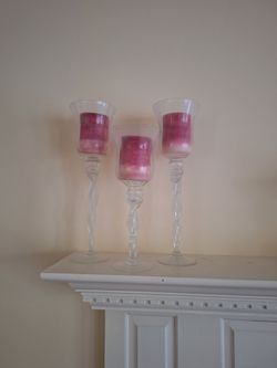 Candle glass trio with candles included.