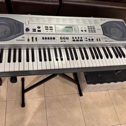 Casio 61 Key Electronic Key Lighting System Keyboard with Stand and AC Power Adapter Model: LK-90TV