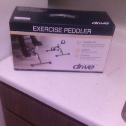 NEW IN ORIGINAL BOX, EXERCISE PEDDLER 