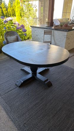 Black wooden round table