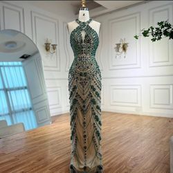 Elegant green bedazzled dress