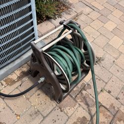 Hose Holder. Preowned With  Hose 