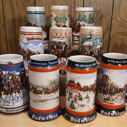 (12) Budweiser Holiday Collector Steins 1982-1993