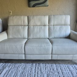 New ivory leather Cindy Crawford power recliner-headrest sofa in excellent condition Delivery available 