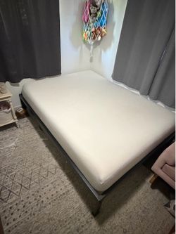 Queen size mattress and bed frame