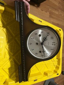 vintage Mayfair mantel clock featuring a tambour-style