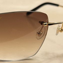 Authentic Cartier Sunglasses - Elegant Gold Rims with Striking Brown Lens