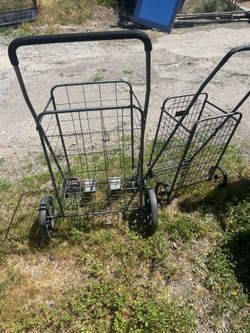 Two foldable shopping carts with wheels