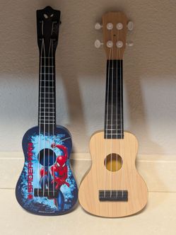 2 toy ukuleles