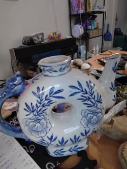 Blue and White Ceramic Teapot with Bird Handle