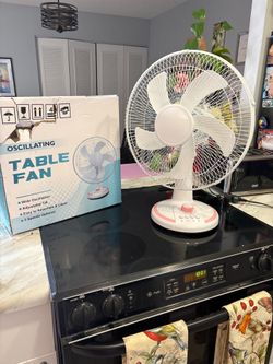New 16” oscillating table fan w 3 speeds