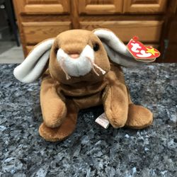 Ty Beanie Babie “Ears” Bunny 1995.  Size  7 inches tall.  Sits  up.  Brand New with Tags.  Has been on display in a cabinet with a Ty beanie Babie col