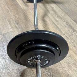 Standard Curl Bar With Pairs Of 25s, 10s And 5s. (Total: 96 lbs)