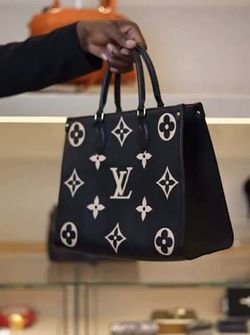 ** Louis Vuitton on-the-go black/cream gorgeous bag