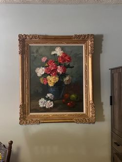 Painting of flowers with gold frame