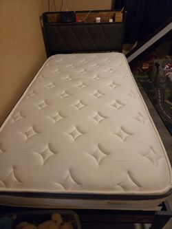 Twin bed with mattress