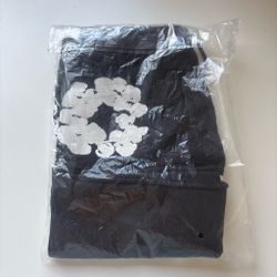 Black and white denim tears shorts
