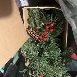 Cedar 6’ Lit Christmas Tree with Red Berries suitable for outdoors Plug in 