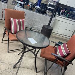Two folding chair with table with the cushions