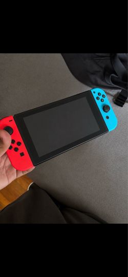 Nintendo Switch (BRAND NEW CONTROLLERS)