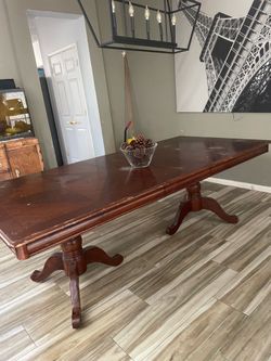 Dining table seats up to 6-8 people.