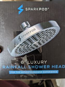 SparkPod 6-inch high-pressure rainfall shower head in polished chrome.