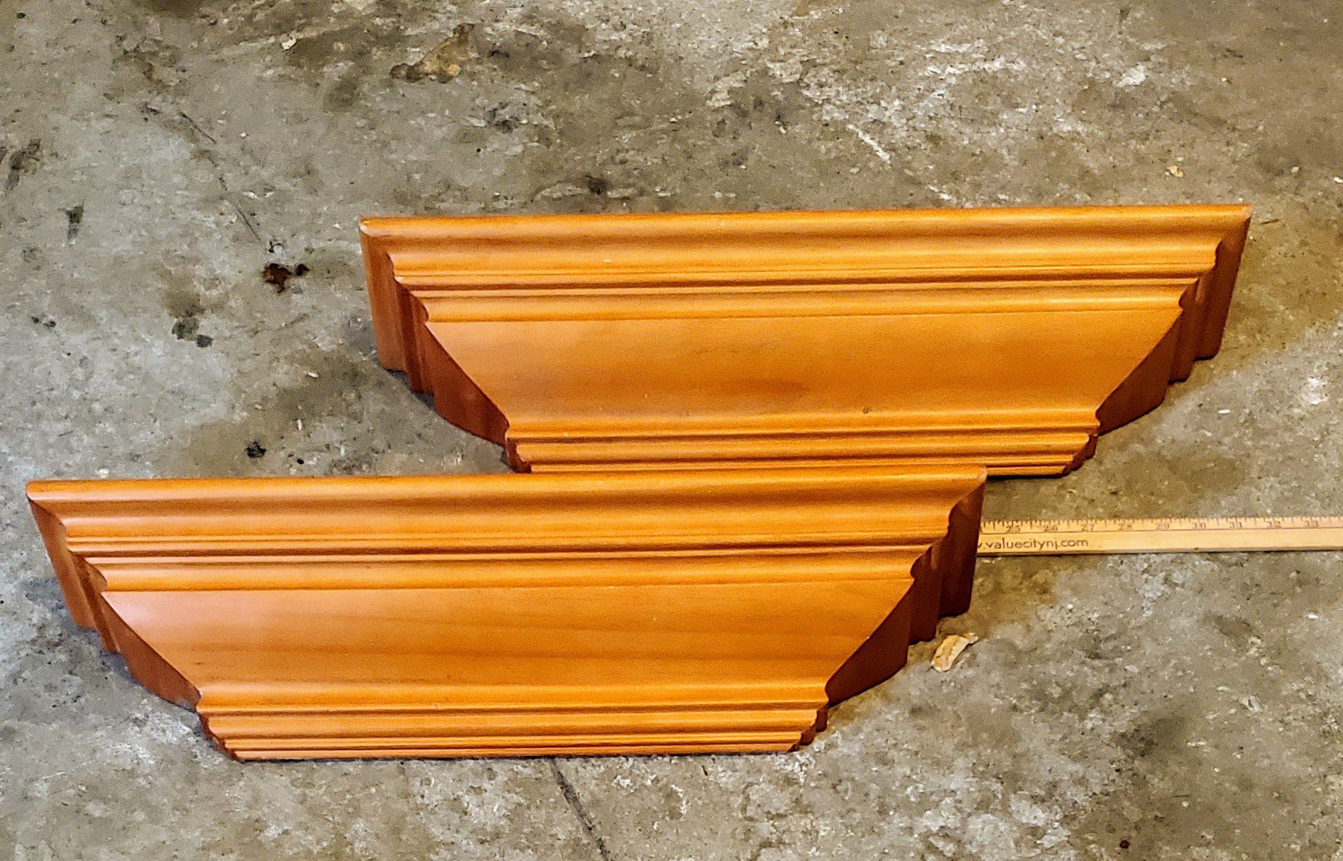 2 x 24" solid wood wall mounted display shelves.
