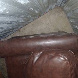 Mocha brown leather love seat