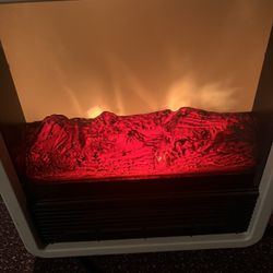 Electric heater 14x13x8D  works fast & hot, 2 settings 750W & 1500W